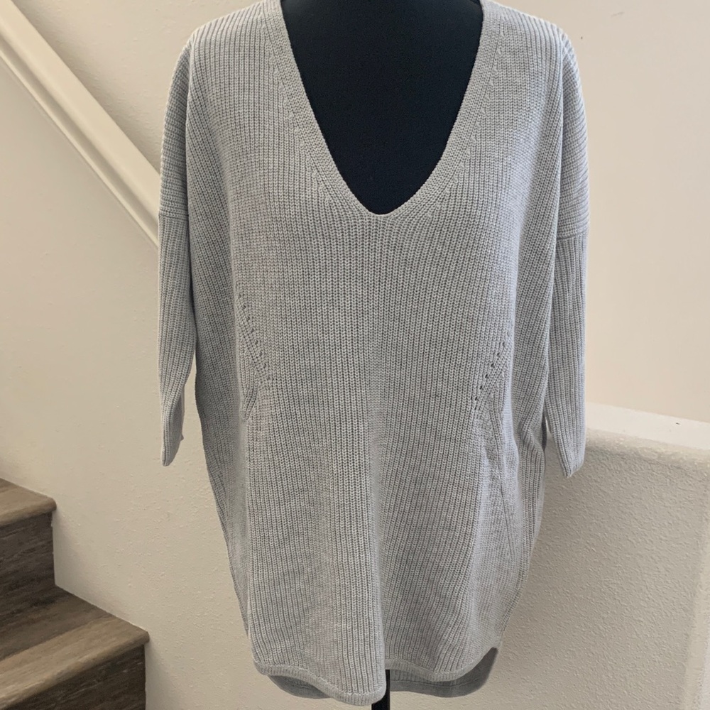 Express Women's V-Neck Sweater in Light Gray.